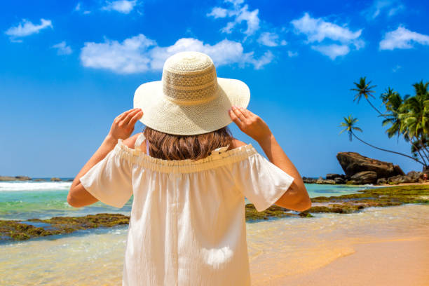 istock Woman on a tropical beach 1343642439