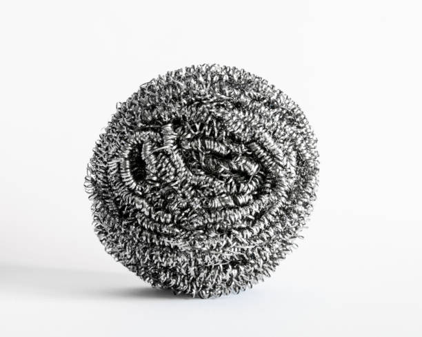 istock Wire scrubbing. Spiral wire cleaning dirty kitchen utensils 1343643302