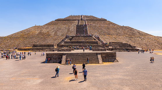 Teotihuacan, Mexico - March 23, 2020: Sun pyramid of Teotihuacan with tourists near Mexico City.