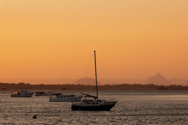 Dusk At Glass House Mountains Australia Viewed Across The Pumicestone Passage From Bribie Island