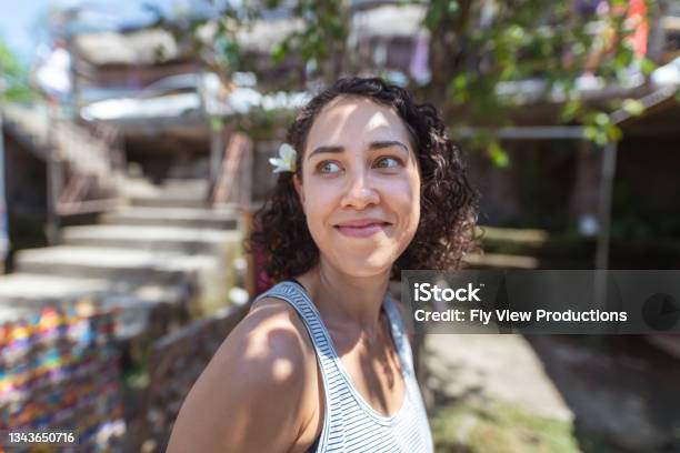 Portrait Of Mixed Race Female Tourist At Outdoor Market Stock Photo - Download Image Now