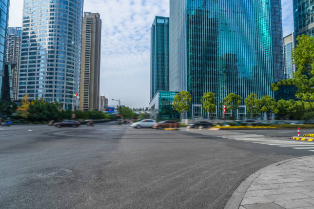 istock Empty asphalt road through modern city in Shanghai, China 1343653428