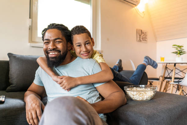istock Father and son relaxing at home. 1343659514