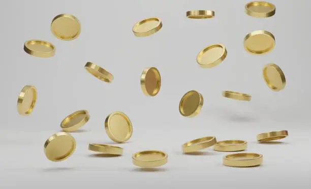 Photo of Falling golden coins on a white background. 3d rendering