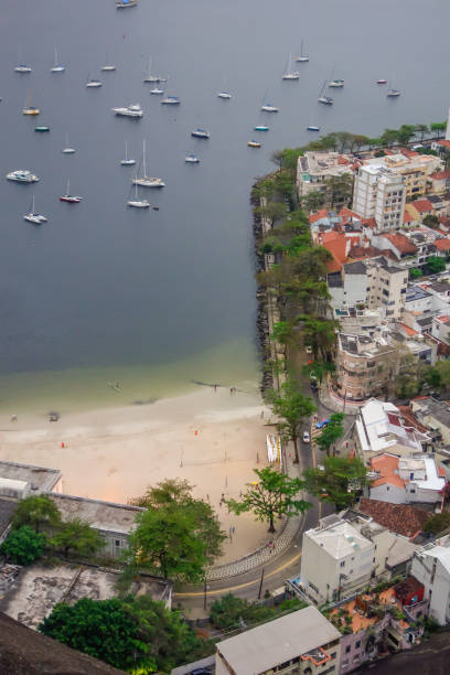 high angle of urca beach and buildings on guanabara bay in rio de janeiro, brazil - urca imagens e fotografias de stock