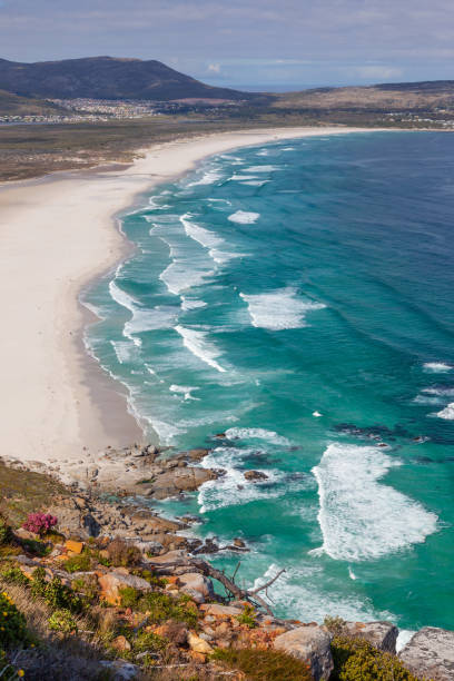 Long Beach in Cape Town, South Africa The expanse of Long Beach, with Kommetjie in the background, Cape Peninsula, South Africa. kommetjie stock pictures, royalty-free photos & images