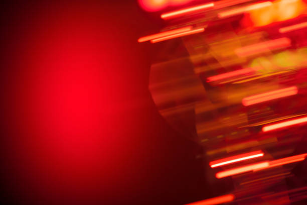 Abstract background with motion blurred lines and spots in red tones. Space for copy.