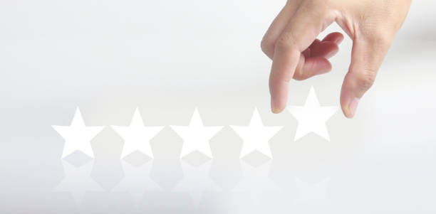 istock Rise on increasing five stars in human hand, Increase rating evaluation 1343681349