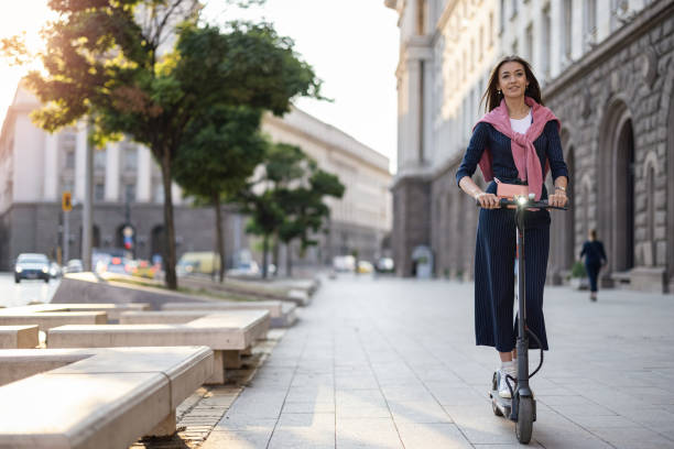 istock Student riding e-scooter in the city 1343684971