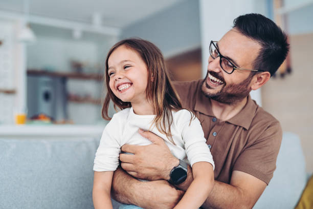 istock Happy father holding his little daughter 1343691229