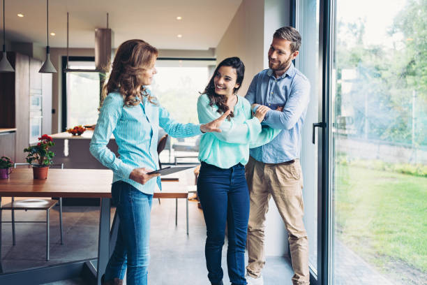 istock Happy young couple buying house 1343691233