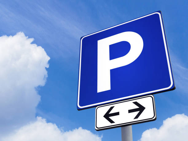 istock Parking signal with cloudy sky 1343693126
