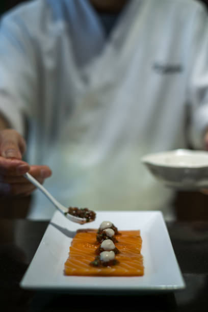 istock The process of making and decorating salmon sashimi. 1343693851