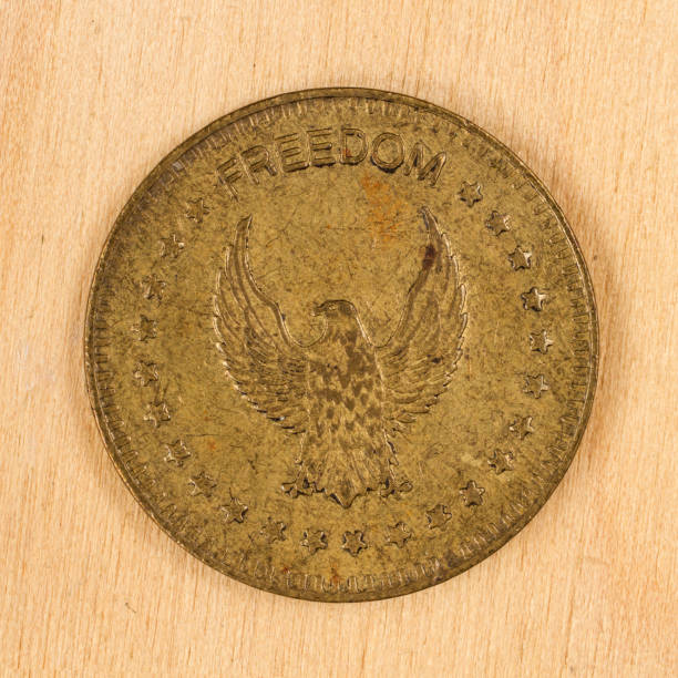 Game and trading token. US Token No Cash Value Freedom. Copper coin.