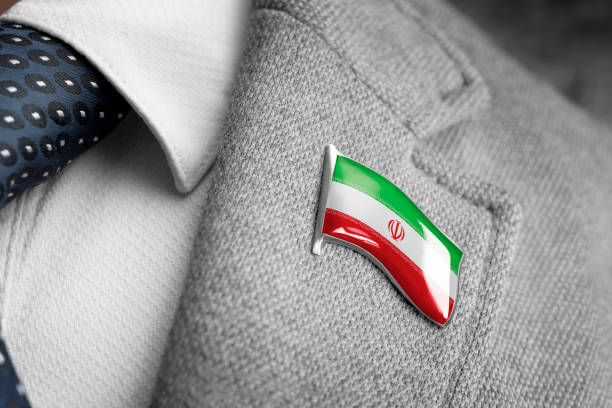 metal badge with the flag of iran on a suit lapel - lapel brooch badge suit imagens e fotografias de stock