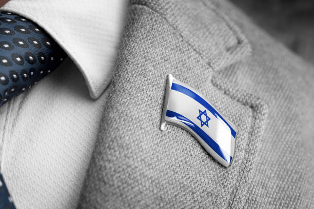 metal badge with the flag of israel on a suit lapel - lapel brooch badge suit imagens e fotografias de stock