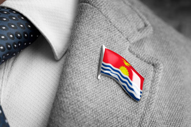 metal badge with the flag of kiribati on a suit lapel - lapel brooch badge suit imagens e fotografias de stock