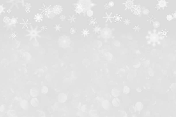 istock snowflakes on a light gray background with bokeh. 1343703353