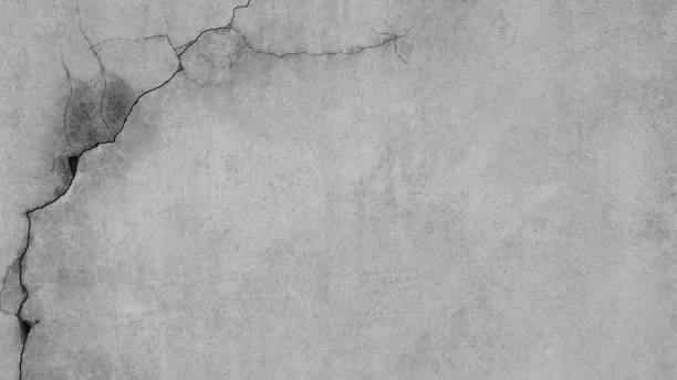 istock The old cement wall was weathered. 1343714102
