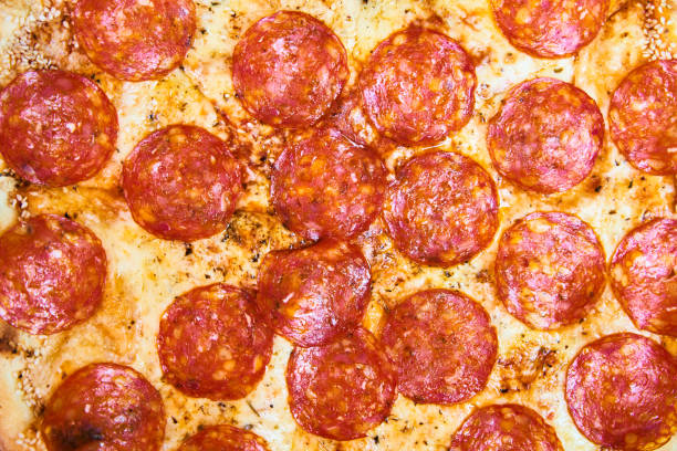 istock Delicious fresh pepperoni pizza in a box close up 1343747144