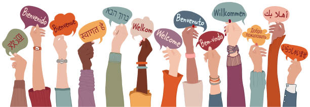 Raised arms and hands of multi-ethnic people from different nations and continents holding speech bubbles with text -Welcome- in various international languages.Communication. Community People who welcome. Multiethnic community concept. Diversity of people. Communication between multicultural and multiracial people. Social network concept. Communication concept. Dialogue between different cultures. Talk or converse with people abroad. Dialogue between colleagues or collaborators or collaborators of different races. Concept of globalization and integration greeting stock illustrations