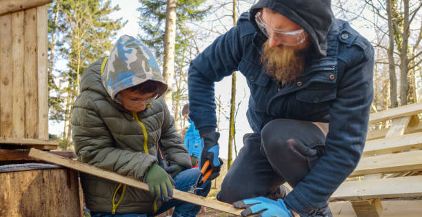 istock Teacher and student making a wooden box 1343764588