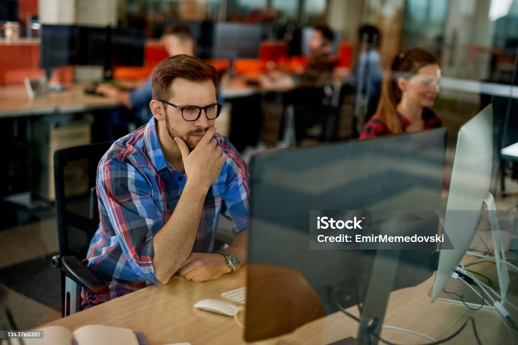 Computer Programer Image Focused Computer Programmer Working At His Desk Stock Photo - Download ...