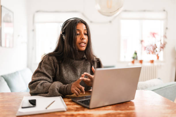 istock Woman on a video call from home 1343765599