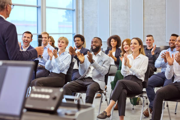 istock Pleased audience during business seminar 1343772892