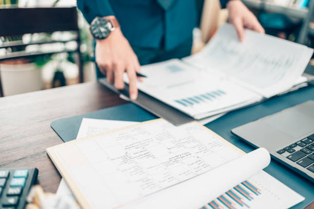 istock A man hand planning daily appointment and note at office desk. Planner plan Schedule Calendar and reminder. Business planning appointment concept. 1343775005