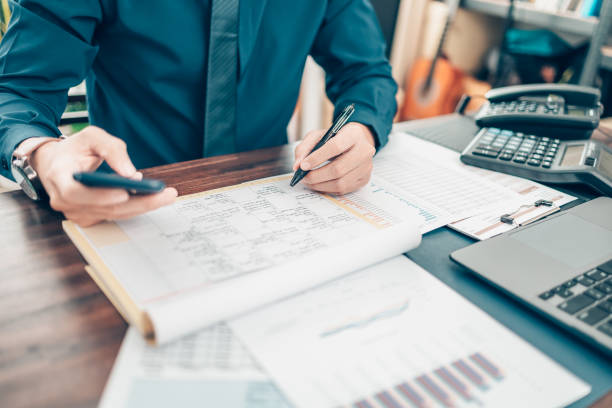 istock A man hand planning daily appointment and note at office desk. Planner plan Schedule Calendar and reminder. Business planning appointment concept. 1343775032
