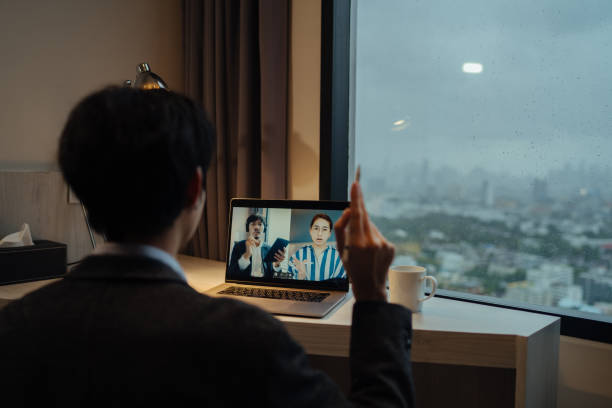 istock Handsome man explains the process of working online. 1343783205