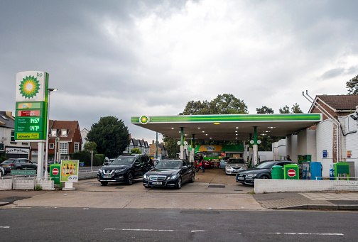 Cars refuelling at a BP filling station forecourt in south-east London.