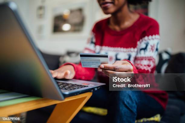 Close Up Of An Unrecognizable African American Woman Spending Winter Holidays At Home Stock Photo - Download Image Now