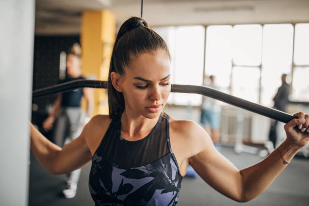 istock Fit woman exercising in gym 1343795821