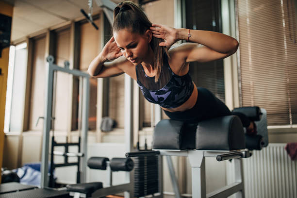 istock Woman exercising in gym 1343795973