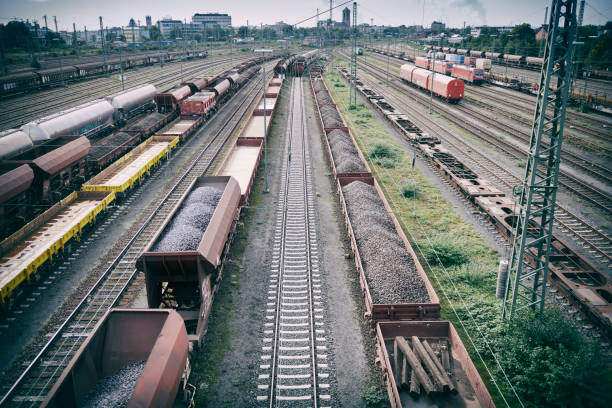 Neuss, Germany- Sept. 28, 2021: Elevated view of freight trains and railroad tracks at the freight depot of Neuss, North-Rhine-Westphalia.