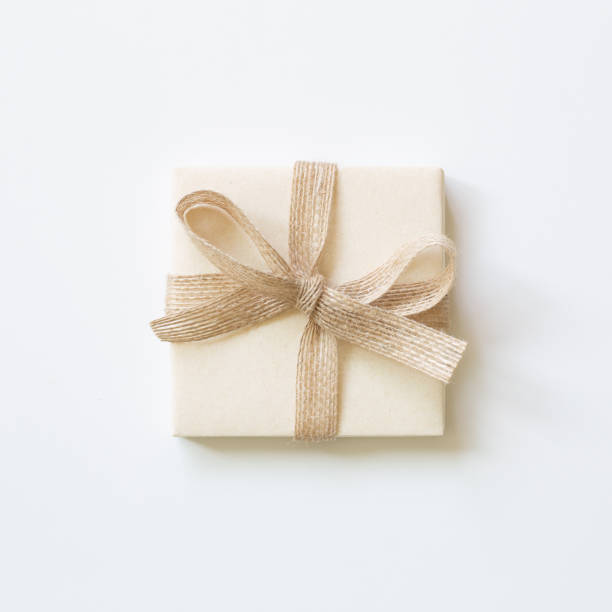 istock Ivory gift box isolated on white background. top view, copy space 1343810648