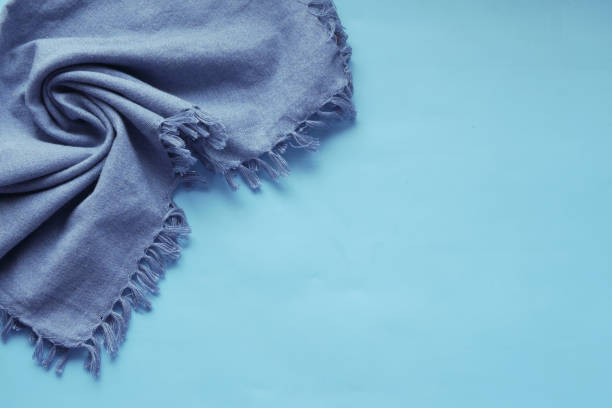 istock blue color table napkin on blue background 1343811272