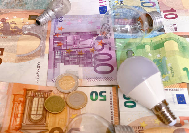 istock Background with euro bills and light bulbs 1343826364