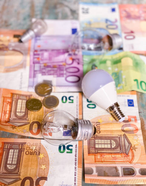 istock Background with euro bills and light bulbs 1343826390