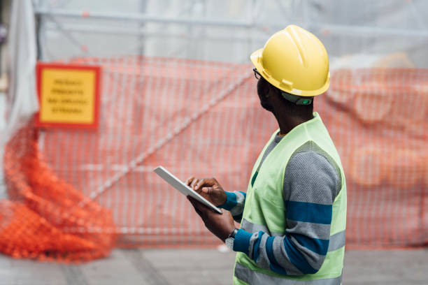 istock African American engineer working on his tablet on the construction site 1343827557