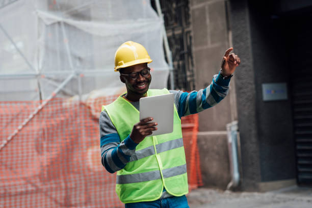 istock African American engineer managing works on the construction site 1343827562