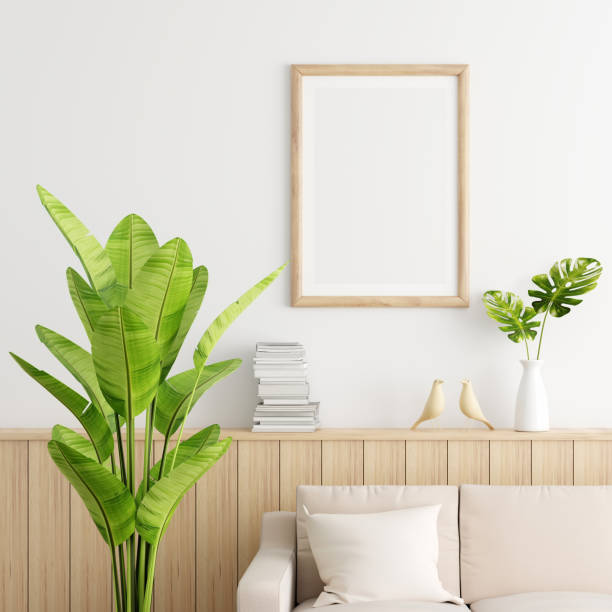 istock Wood picture frame mockup in white living room, 3D rendering 1343835208