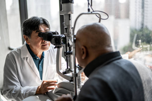 istock Ophthalmologist examining patient's eyes 1343839259