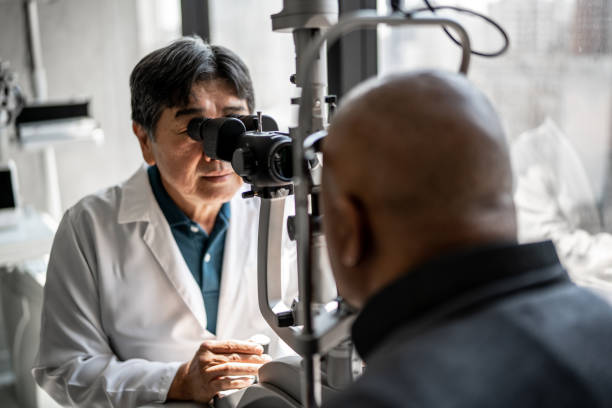istock Ophthalmologist examining patient's eyes 1343839262