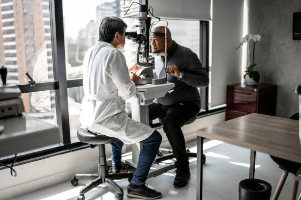 istock Ophthalmologist examining patient's eyes 1343839269