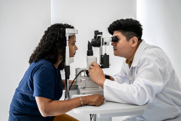 istock Ophthalmologist examining patient's eyes 1343839301