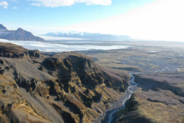 istock mountains over river and ice from aerial view 1343839372