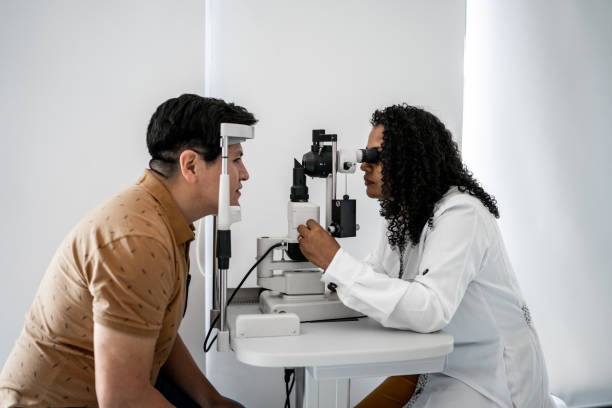 istock Ophthalmologist examining patient's eyes 1343839527